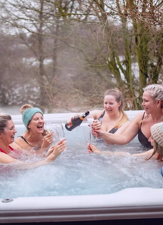 Hot tub and enclosed decking at River Rede Glamping